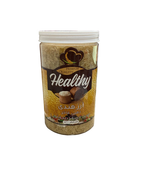 Container of 'Healthy' brand product on a wooden surface with a phone displaying a time in the background.